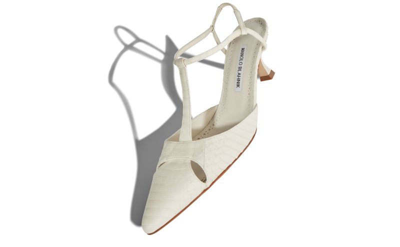 Turgimod, Cream Snakeskin T-Bar Pumps - US$975.00