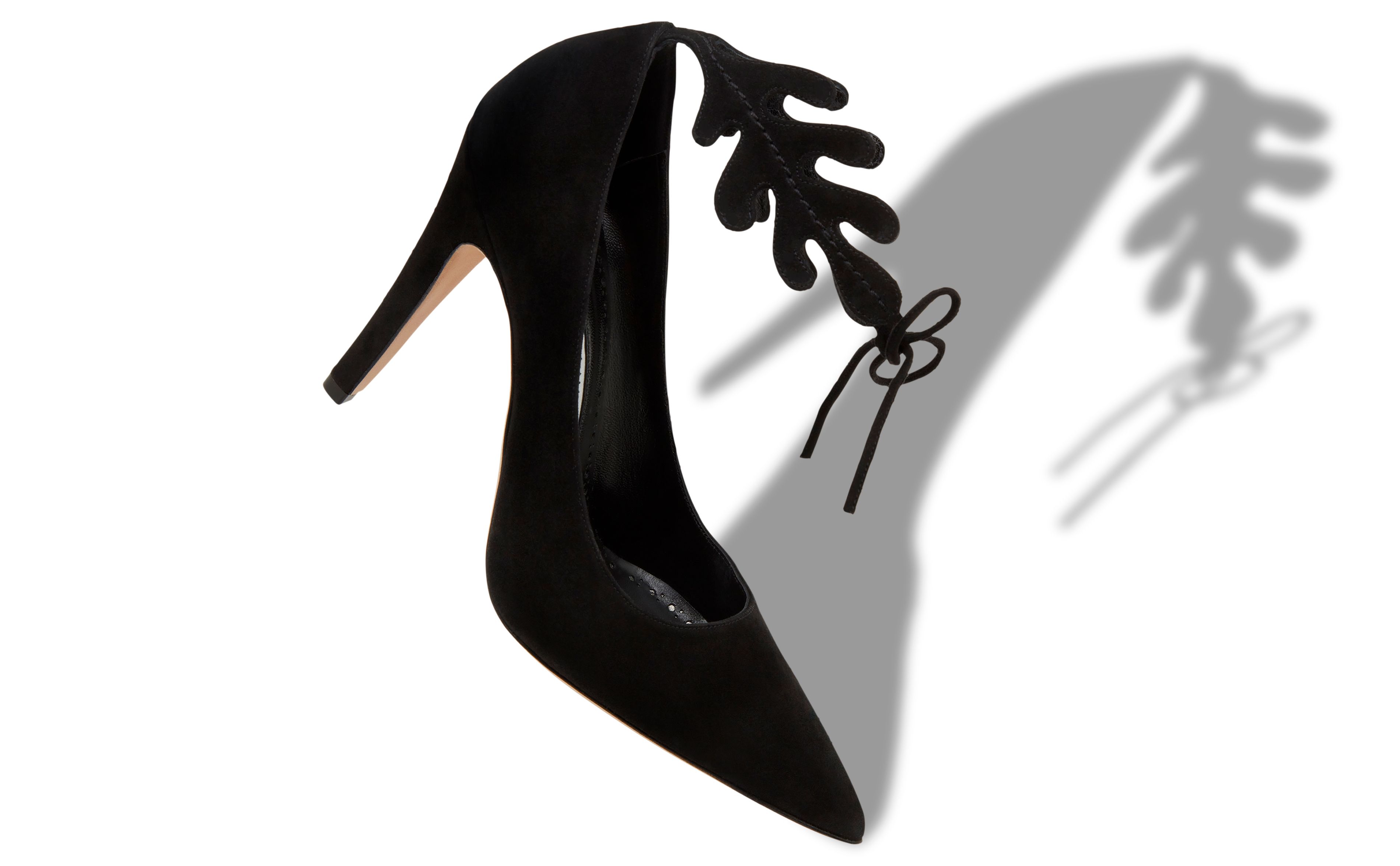 Black and white pumps with ankle strap clearance