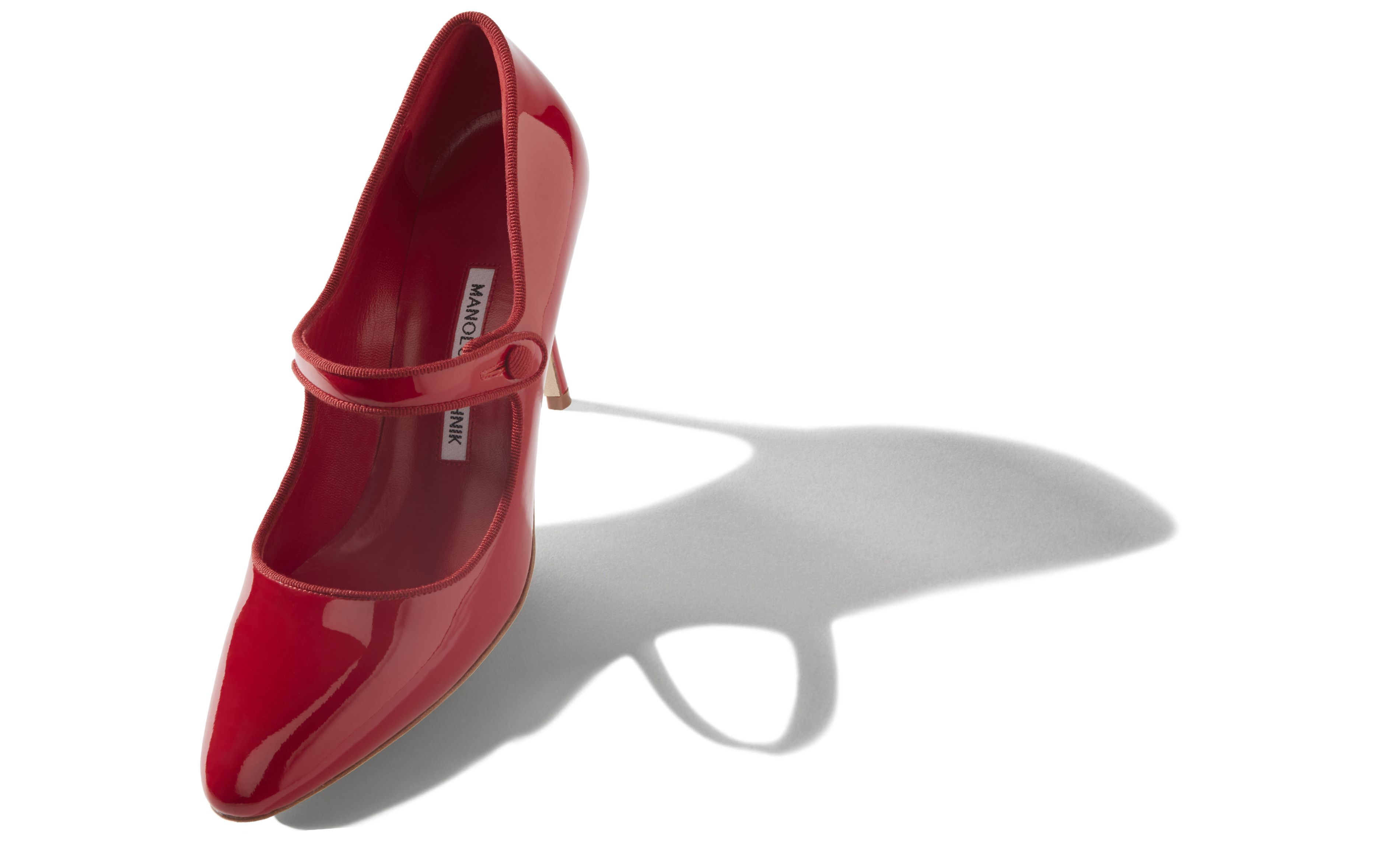 round toe patent pumps
