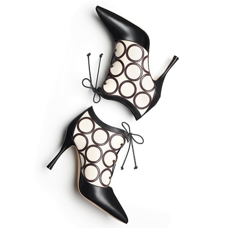 Black and white calf leather boots