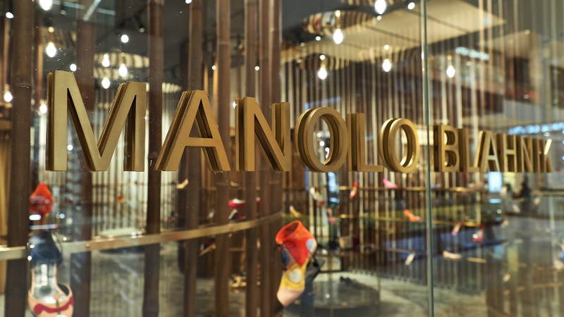 Manolo in capitals attached to the glass window of the Kuala Lumpur store. 