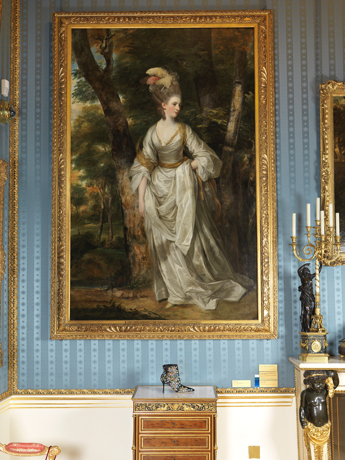 The Lepanto boot is positioned in front of Joshua Reynold’s painting of Mrs Elizabeth Carnac.